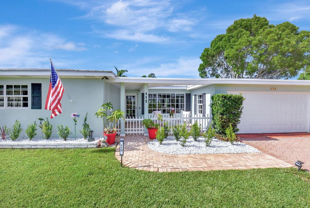 Photo of 112 Heather Lane, Delray Beach, FL 33444 (MLS # R11000756)