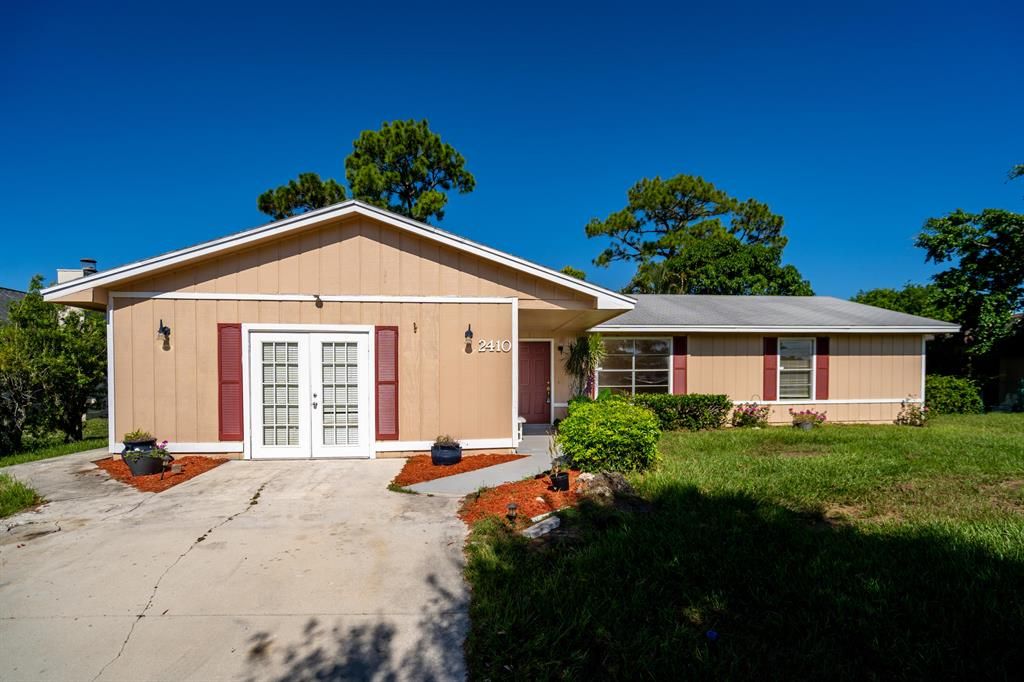 Photo of 2410 SW Summit Street, Port St Lucie, FL 34984 (MLS # R10822452)