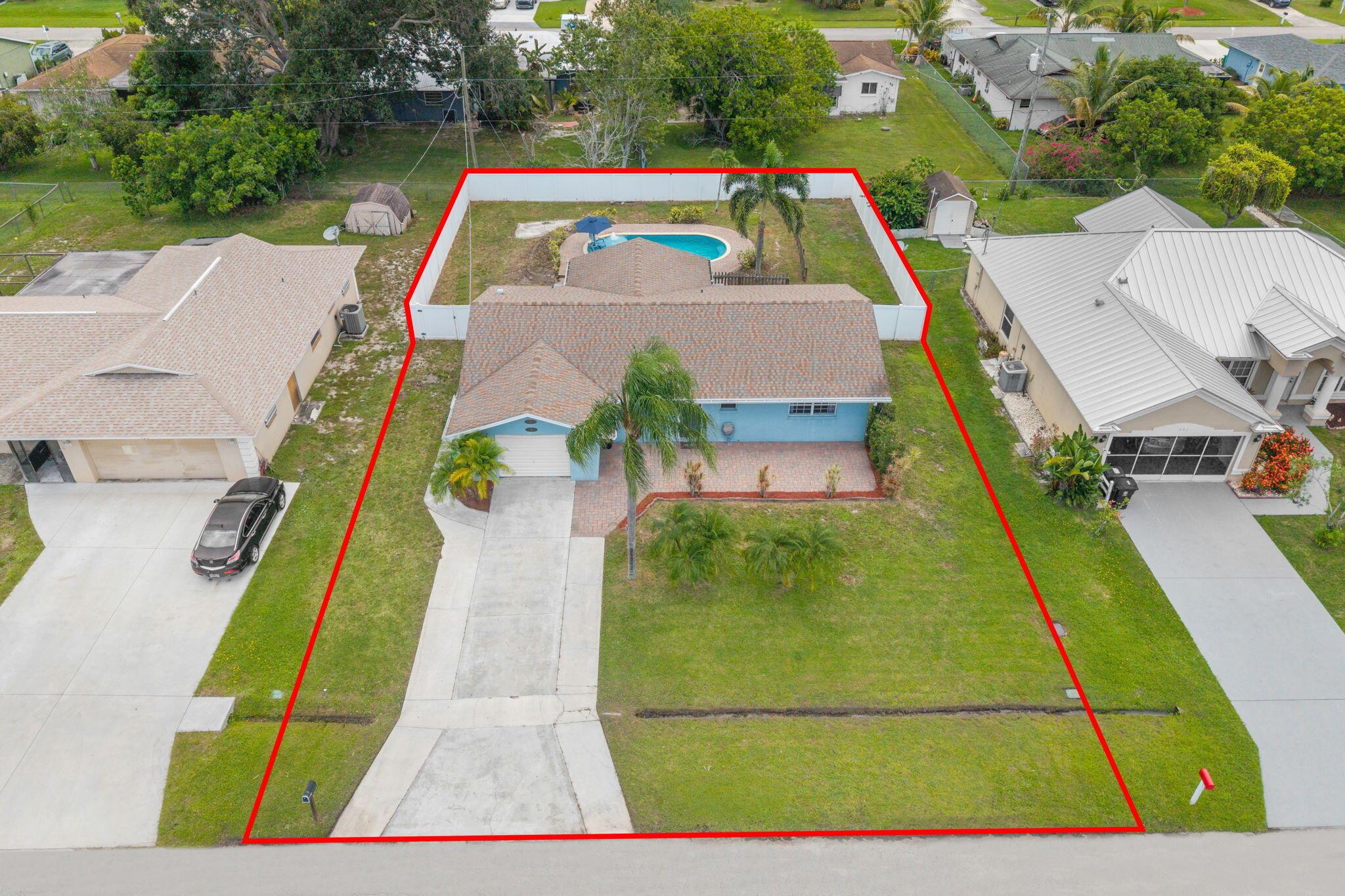 Discover this charming 2BR/2BA CBS Pool home with an oversized 1 car garage. Relax in the pool that was designed with a 7.5 ft sun shelf with a fountain that can accommodate 2 chairs, a table and an umbrella. The pool which was installed in 2016 has Eastern exposure and is surrounded by extensive paver decking for outdoor entertaining. The large backyard is enclosed by vinyl fencing with a double gate for RV/Boat parking. Tongue and Groove ceilings throughout entire home. Beautiful kitchen features upgraded cabinetry, double wall oven, smart fridge, and island. ROOF 2020, WATER HEATER 2024. Start living the Florida Lifestyle!