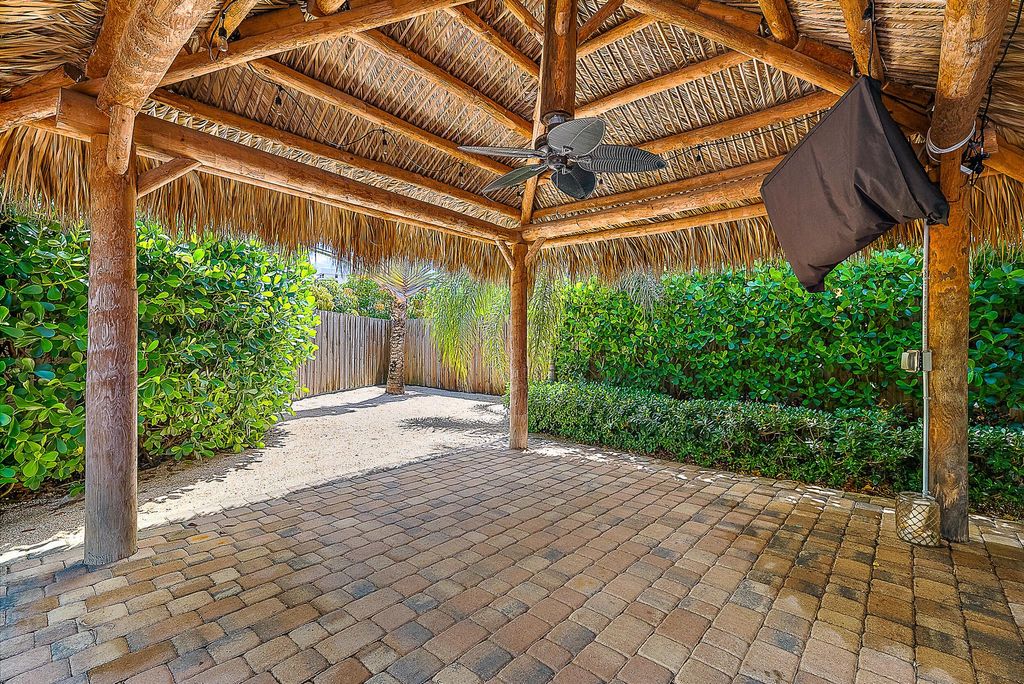 Photo of 441 Neptune Road, Juno Beach, FL 33408 (MLS # R11108709)