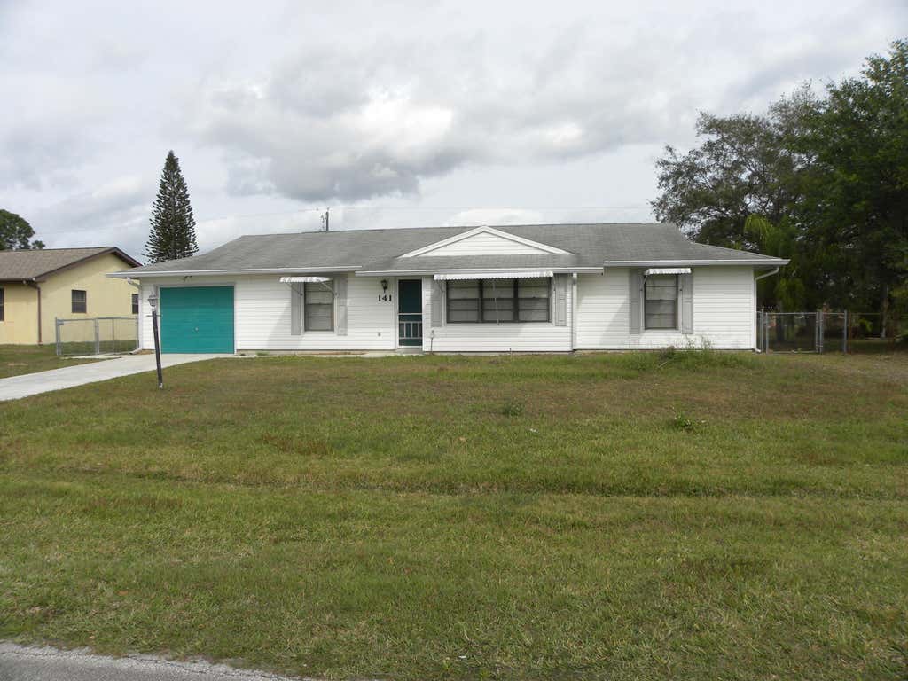 Photo of 141 SW Duval Avenue, Port Saint Lucie, FL 34983 (MLS # R10777665)
