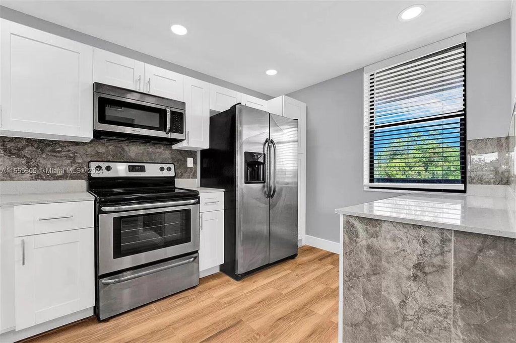 Photo of 2767 Carambola Circle S #401, Coconut Creek, FL 33066 (MLS # B26046734)