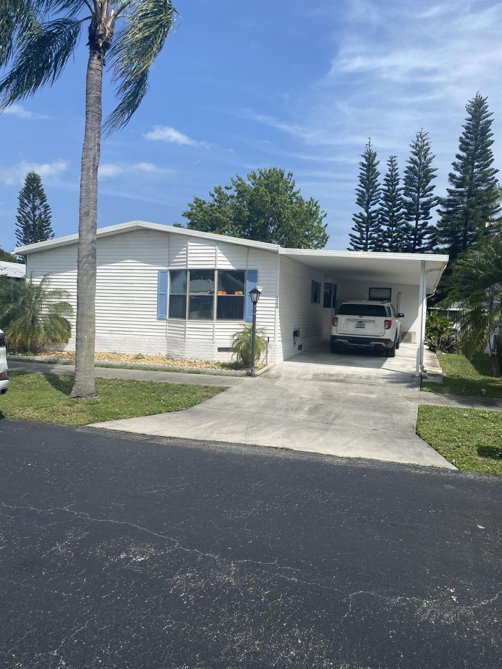 Photo of 6548 Nw 33rd Ave, Coconut Creek, FL 33073 (MLS # R10968757)