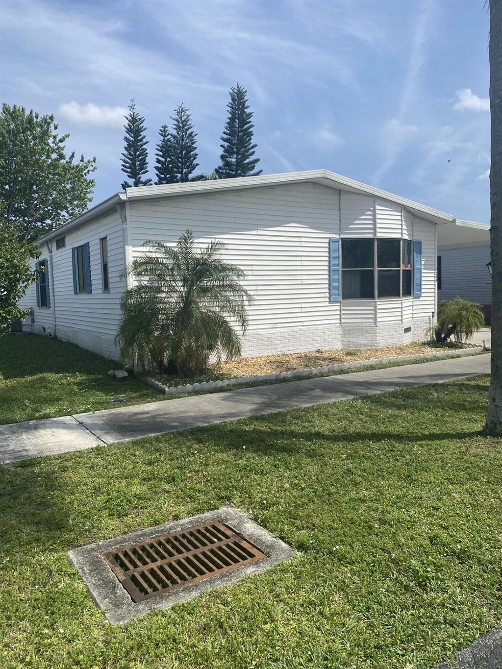 Photo of 6548 Nw 33rd Ave, Coconut Creek, FL 33073 (MLS # R10968757)