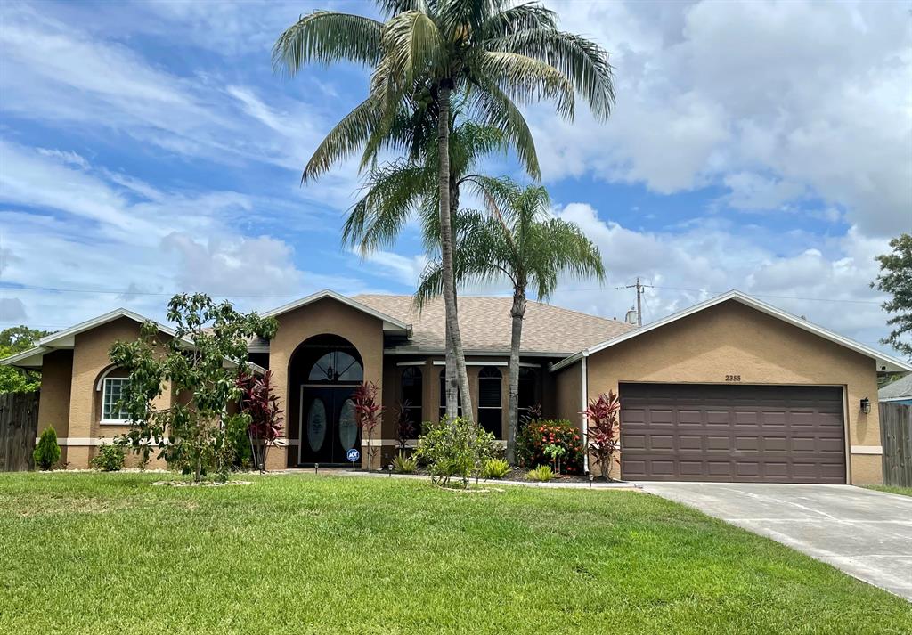 Photo of 2355 SW Salmon Road, Port Saint Lucie, FL 34953 (MLS # R10820171)