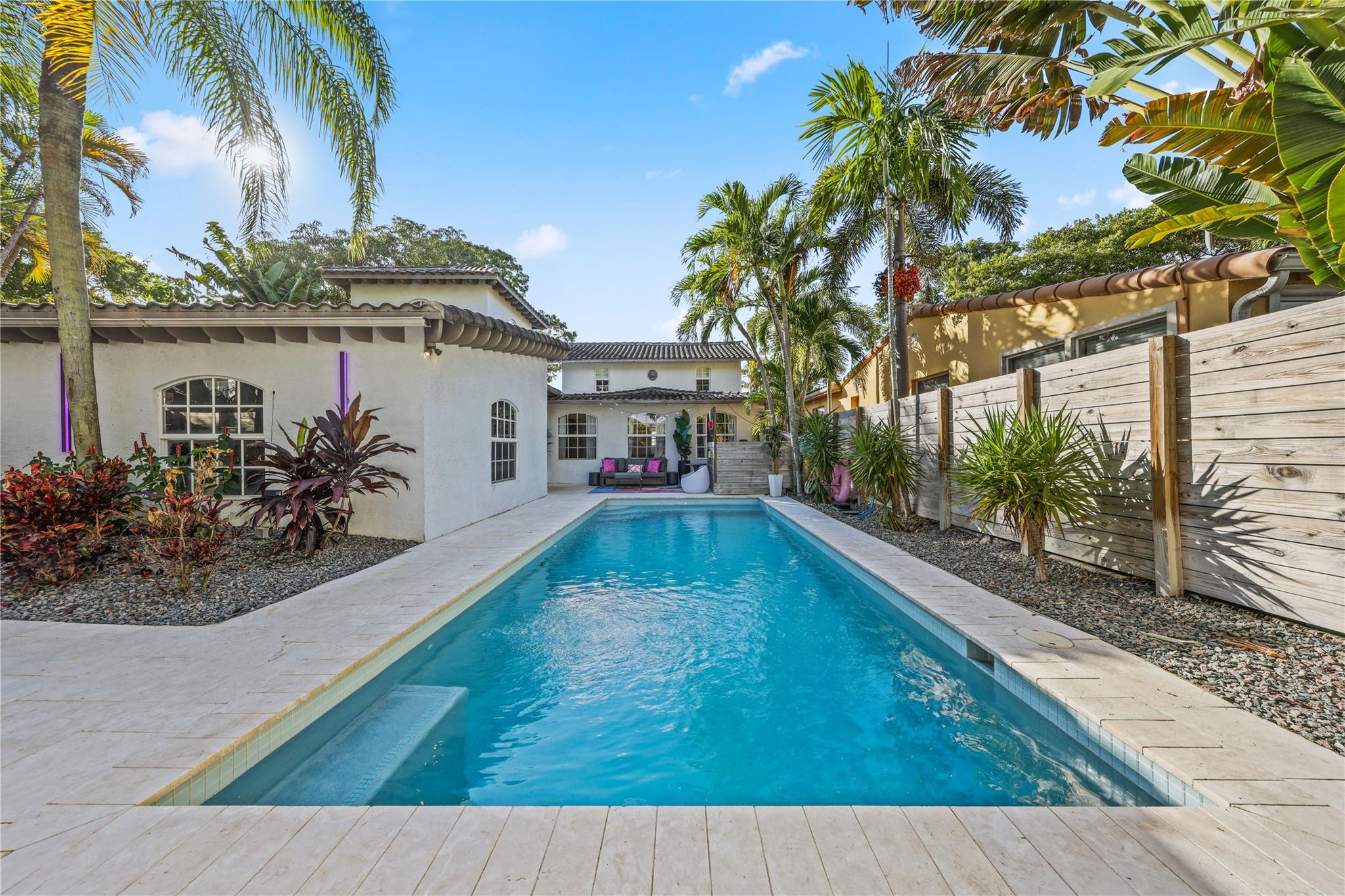 Welcome home to this charming residence nestled in the highly coveted Victoria Park neighborhood. This stunning 5-bedroom, 4-bath residence offers an elegant open-concept kitchen, a versatile den perfect for a home office or playroom, and a thoughtfully designed layout with 4 bedrooms downstairs and a private upstairs primary suite. Enjoy resort-style living with a sparkling pool, fully fenced grounds, and full hurricane protection for ultimate peace of mind. With a 2014 roof and an unbeatable location just steps from parks, upscale dining, and vibrant local hotspots, this home embodies the best of Fort Lauderdale living.
**first photos are virtual renderings**