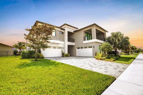 Photo of 17046 Wandering Wave Avenue, Boca Raton, FL 33496 (MLS # B26056208)