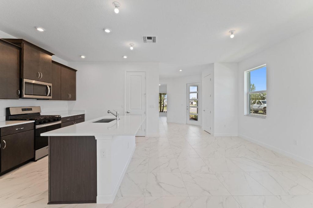 Photo of 13465 SW Margo Terrace, Port Saint Lucie, FL 34987 (MLS # R10971878)