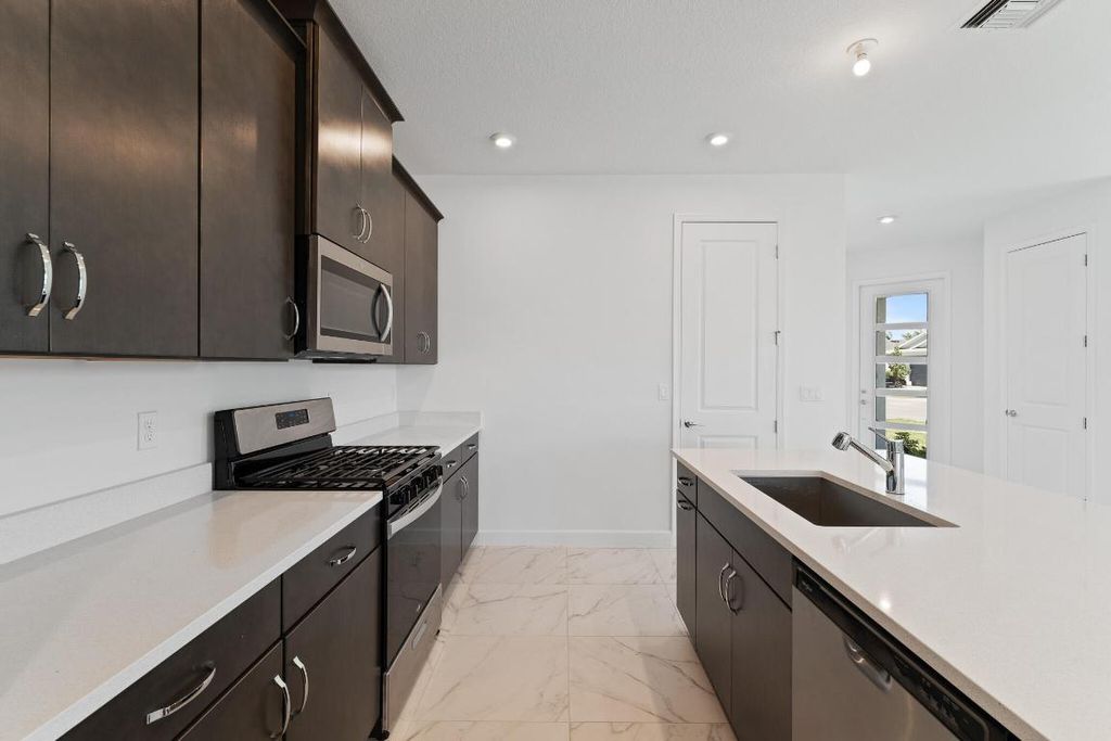 Photo of 13465 SW Margo Terrace, Port Saint Lucie, FL 34987 (MLS # R10971878)