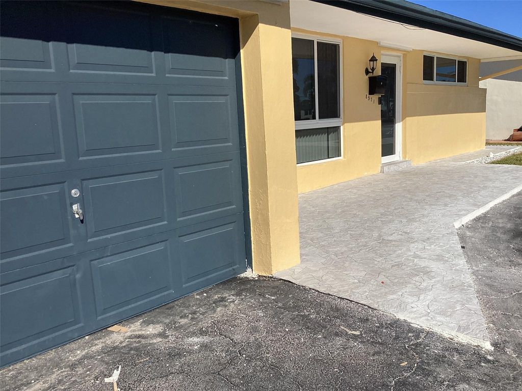 Photo of 8571 NW 26th Street, Sunrise, FL 33322 (MLS # B26021038)