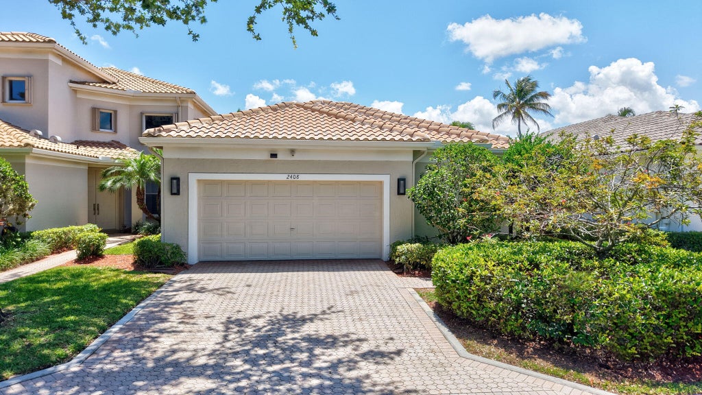 Photo of 2408 NW 67TH Street, Boca Raton, FL 33496 (MLS # B26075511)