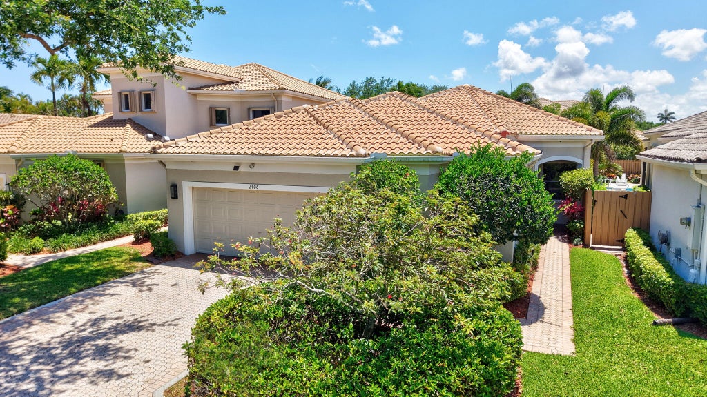 Photo of 2408 NW 67TH Street, Boca Raton, FL 33496 (MLS # B26075511)