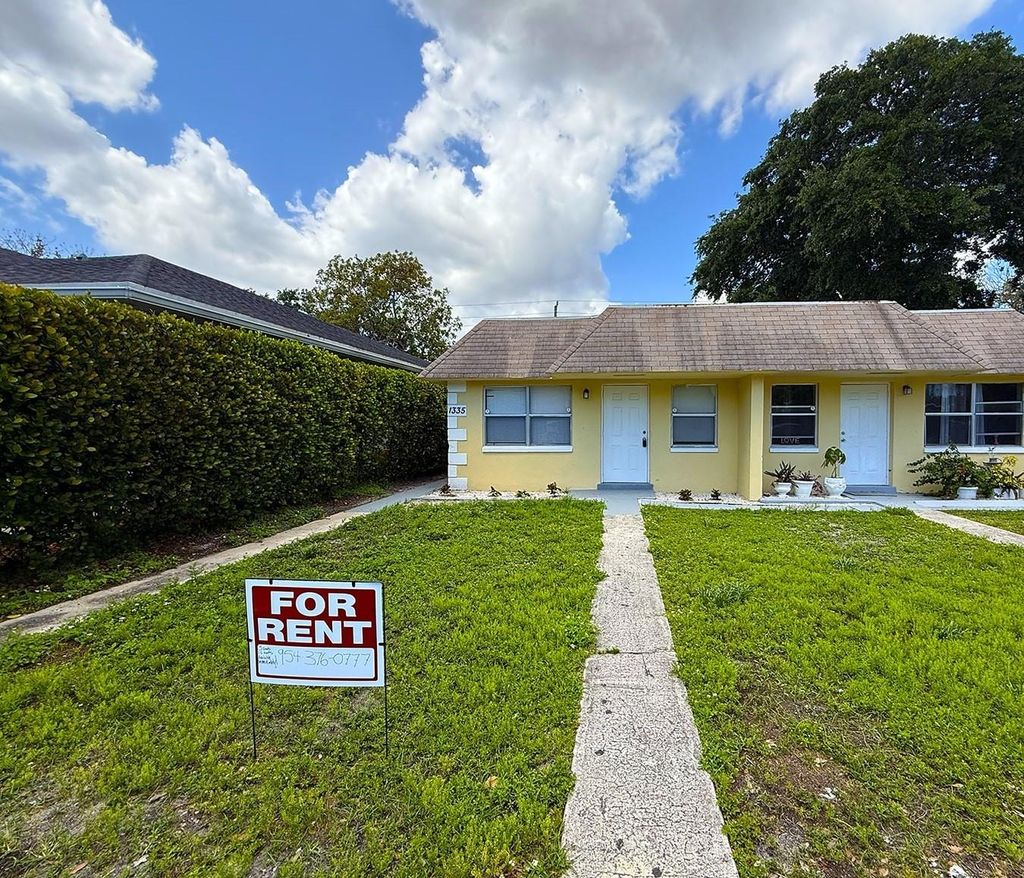 Photo of 1335 NW 7th Ter, Fort Lauderdale, FL 33311 (MLS # F10495795)