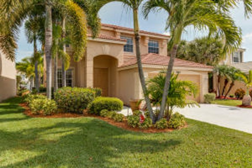 Lush landscaping to covered new double door Entry. Foyer leads to formal living & dining space with ceramic tiled floors on the diagonal. Large Kitchen with island, pantry & ladies desk overlooks coffered breakfast area and family room with garden views. Powder room with pedestal sink in hall. Double door entry to Master Bedroom with tray ceiling and bump out sitting area has his and her walk-in closets. Master Bathroom has his and her sinks with vanity, roman tub, glass shower, linen closet and private w/c. Three Guest Bedrooms upstairs with Double sink guest bathroom with tub shower and private w/c. Storage Area under stairs,  laundry room with tub.