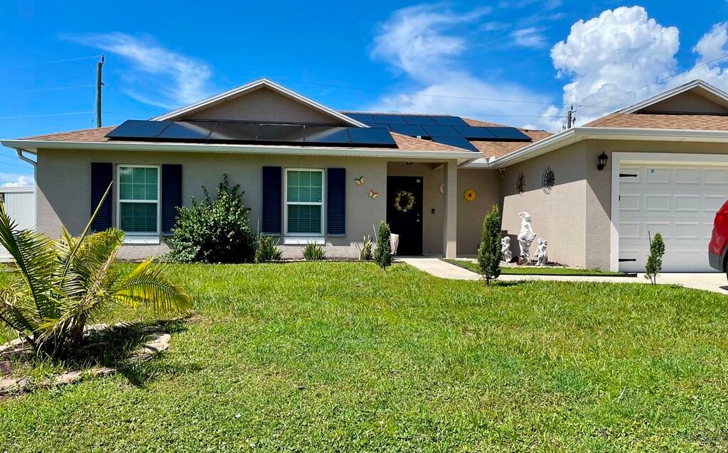 Photo of 1097 SW DARTMOUTH Avenue, Port Saint Lucie, FL 34953 (MLS # B26069024)
