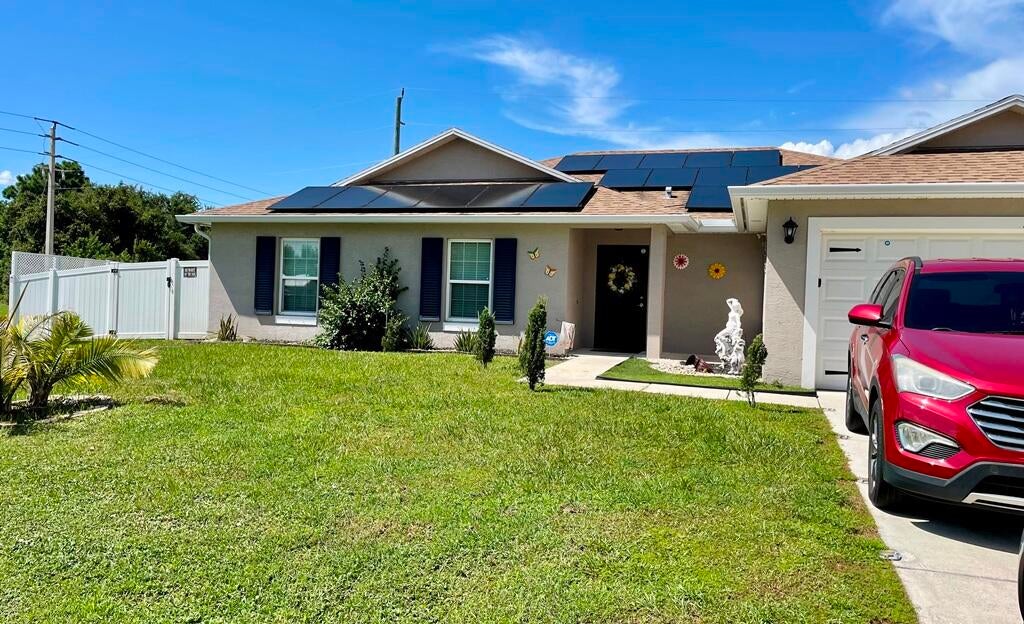 Photo of 1097 SW DARTMOUTH Avenue, Port Saint Lucie, FL 34953 (MLS # B26069024)