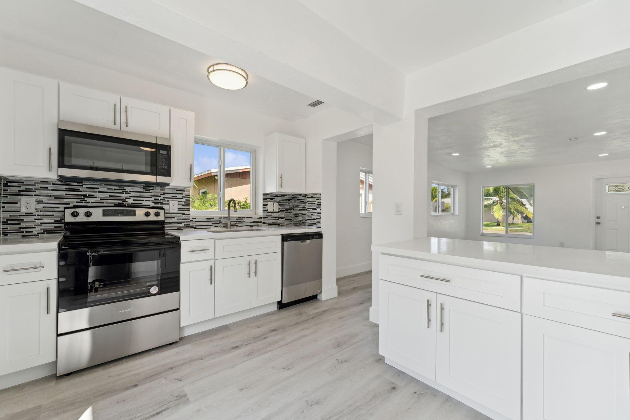 Welcome to your tropical retreat in Deerfield Beach -- a stunning and completely remodeled 3 bedroom, 2 full bathroom paradise is a dream come true for any beach-loving chef or entertainer. Step into an open floor plan that seamlessly flows from living space to a huge chef's kitchen -- containing brand-new, gleaming appliances, all set against a backdrop of sleek, modern design. The granite countertops invite you to whip up your favorite recipes while staying connected with friends and family in the adjoining living area. This house isn't just remodeled; it's reborn. It's a harmonious blend of comfort and style, offering a slice of Florida luxury. The only thing missing is your family! So, whether you're seeking a tranquil escape or planning to host unforgettable gatherings in an