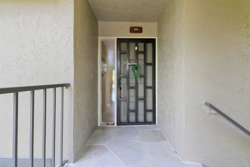 Photo of 5701 Fairway Park Drive #202, Boynton Beach, FL 33437 (MLS # R10987037)