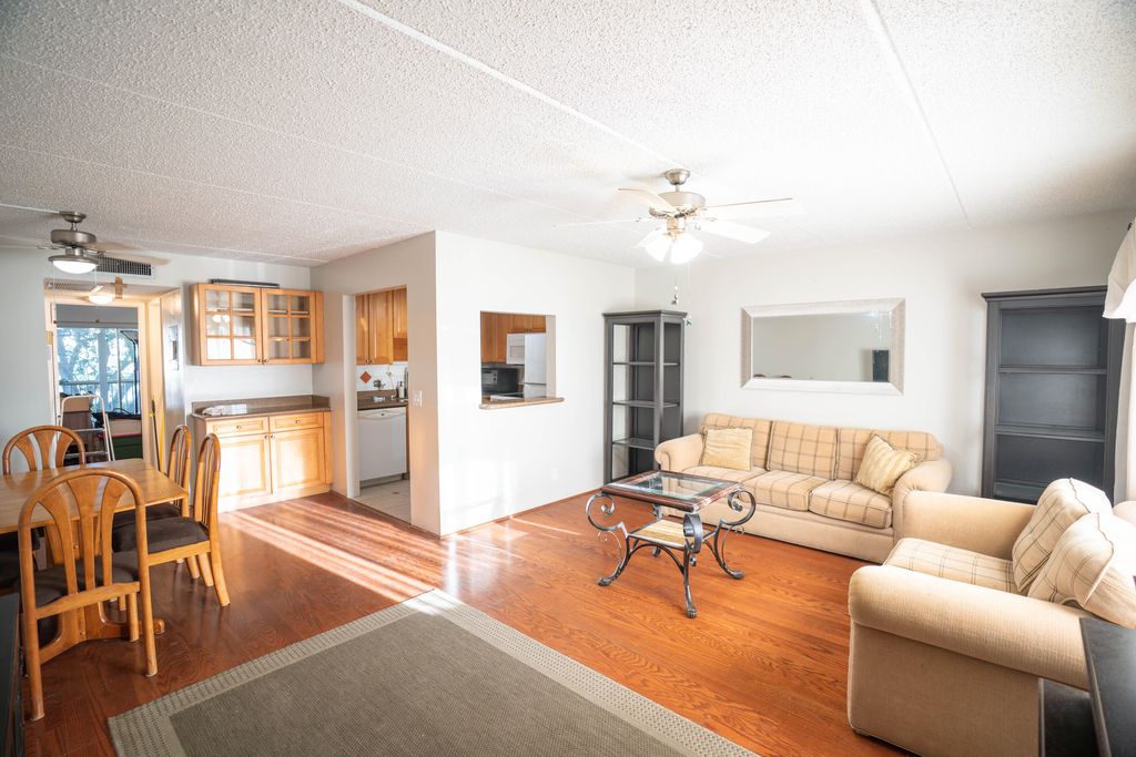 Photo of 400 W Village Green Cir Circle W #214, Palm Springs, FL 33461 (MLS # B26025955)