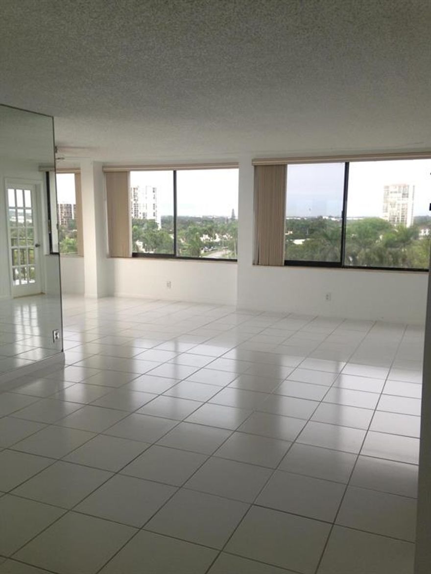 Indulge yourself everyday with amazing panoramic views every day.  Spacious balcony, well-kept quite building.  Upgraded kitchen, title floors and ceiling to floor glass master-room window.