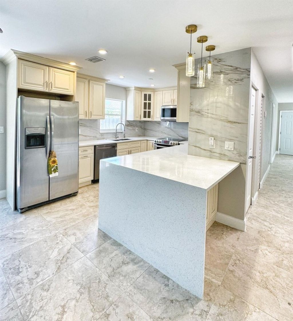 Photo of 708 NW 7th Court, Boynton Beach, FL 33426 (MLS # F10456899)