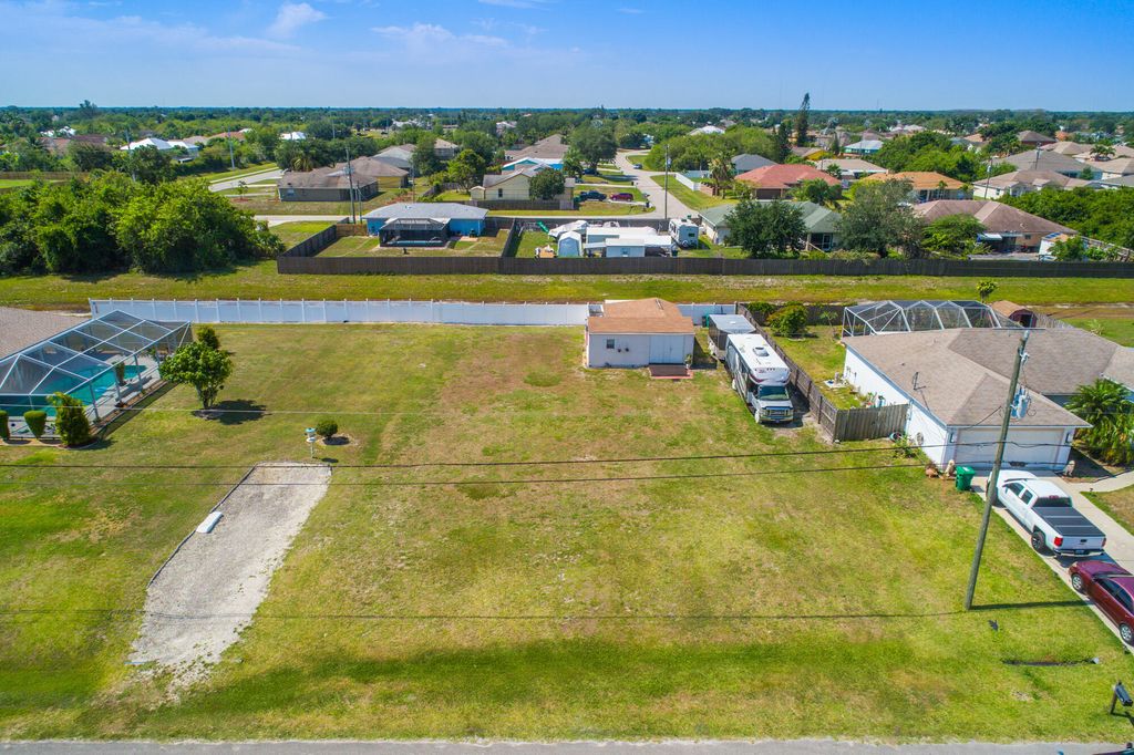 Photo of 314 SW Lacroix Avenue, Port Saint Lucie, FL 34953 (MLS # R10800974)