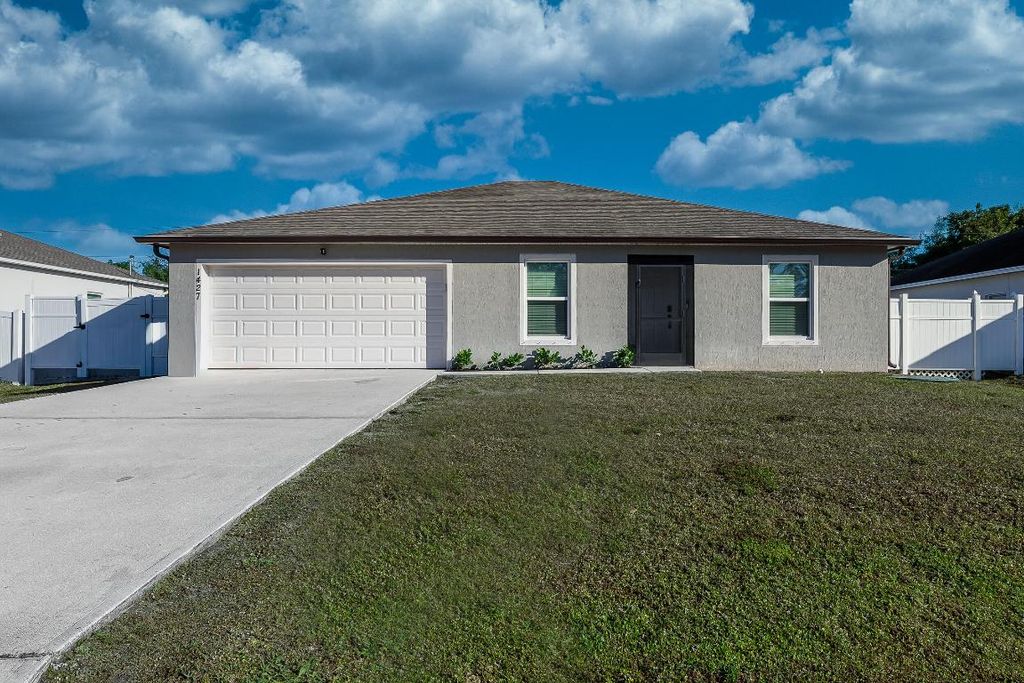 Photo of 1427 SW Leisure Lane, Port Saint Lucie, FL 34953 (MLS # R11152501)