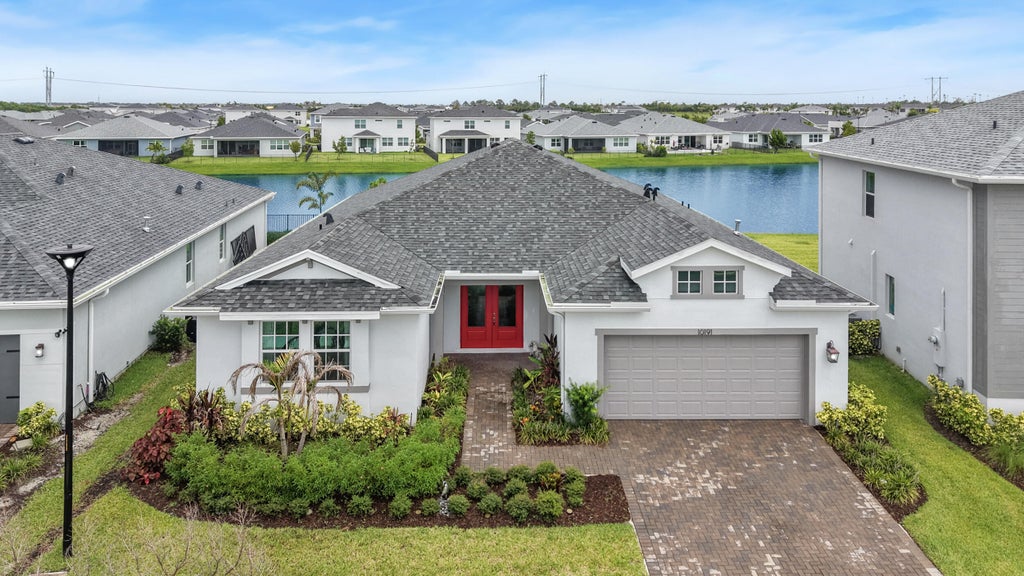 Photo of 10191 SW Orana Drive, Port Saint Lucie, FL 34987 (MLS # B26057416)