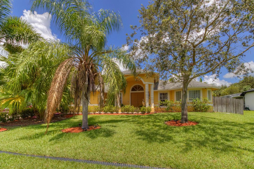 Photo of 2598 SW National Circle, Port St Lucie, FL 34953 (MLS # R10903935)