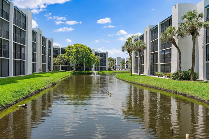 Discover coastal bliss in this charming 1Br, 1.5 bath condo just steps from Jupiter's pristine beaches. Wake up to morning sun streaming over a peaceful lagoon with lush landscaping from your screened balcony. This thoughtfully designed unit features top-tier appliances, laminate flooring,  crown moldings and custom tile. This condo is Located in the sought-after Jupiter Ocean and Racquet Club.  The community features resort-style pools, tennis courts, and manicured grounds. Walk to Jupiter Beach, parks, and the scenic Riverwalk along the Intracoastal. Schedule your showing today!