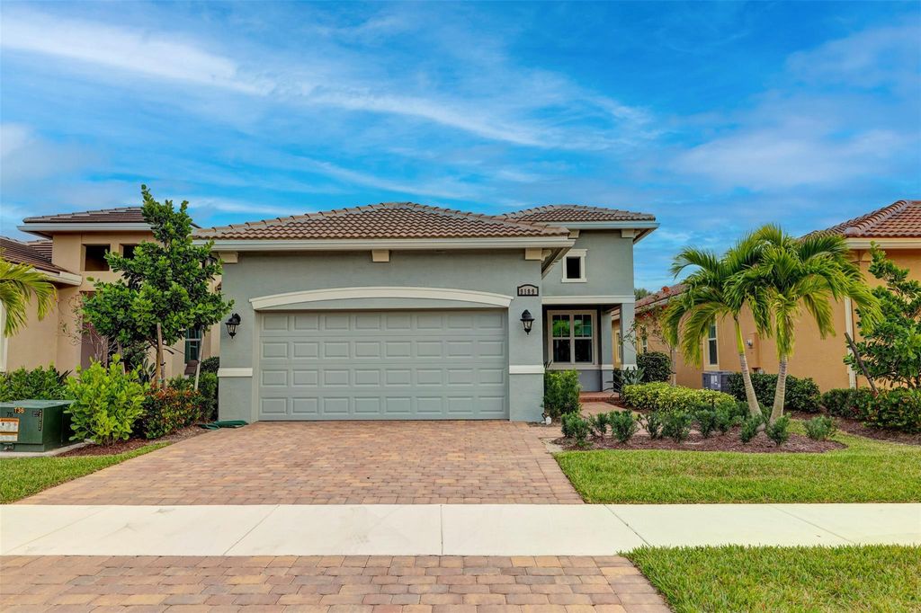 Photo of 9189 SW Pepoli Way, Port Saint Lucie, FL 34987 (MLS # F10430315)