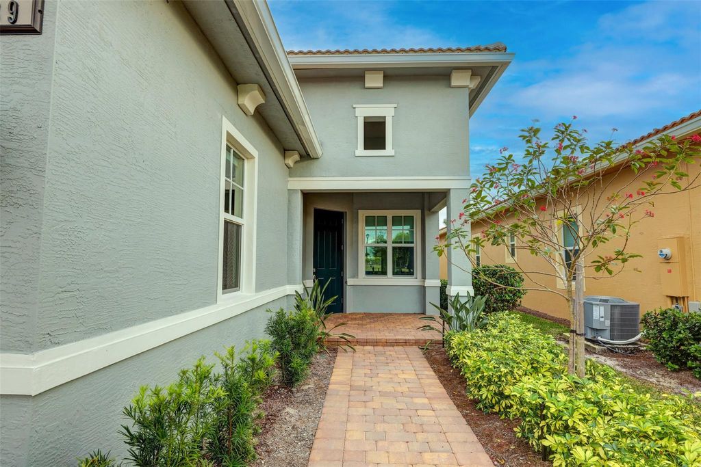 Photo of 9189 SW Pepoli Way, Port Saint Lucie, FL 34987 (MLS # F10430315)