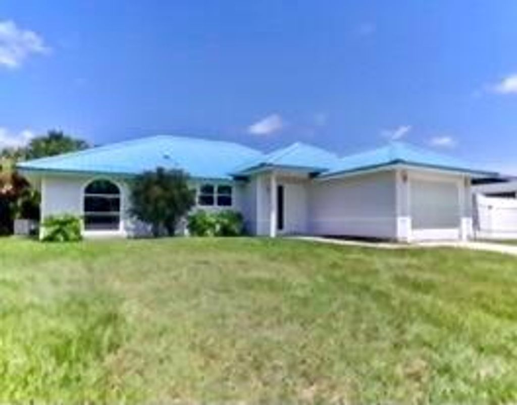 Photo of 3196 SW Areca Drive, Palm City, FL 34990 (MLS # R10809245)