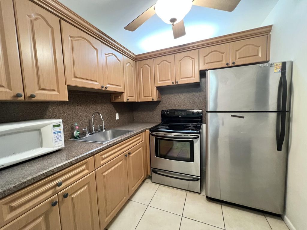 Photo of 4023 Berkshire B #4023, Deerfield Beach, FL 33442 (MLS # B26008366)