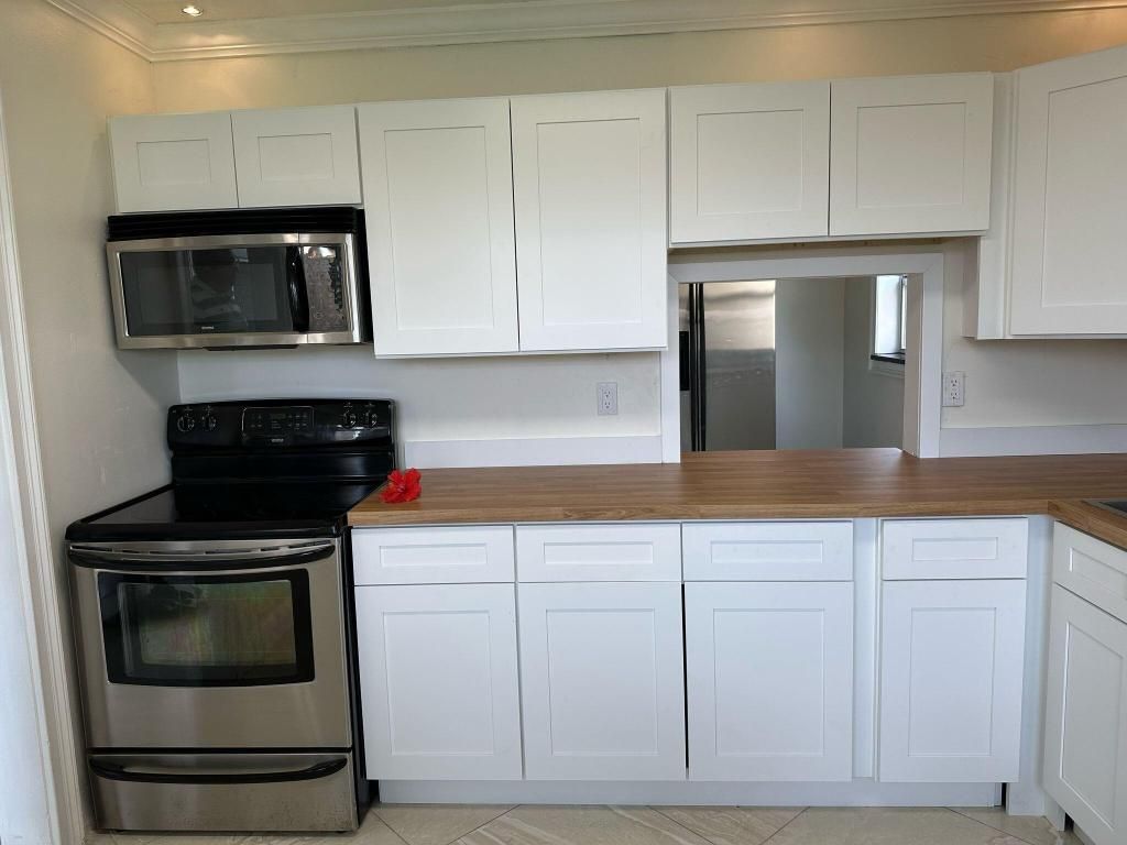 Photo of 142 Lake Anne Drive, West Palm Beach, FL 33411 (MLS # R11148273)