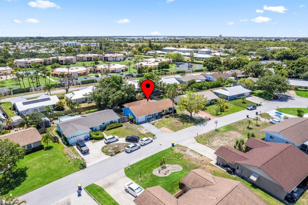 Photo of 2003 NE Aloe Calle, Jensen Beach, FL 34957 (MLS # R11093816)
