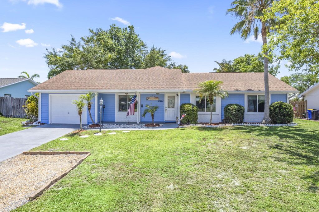 Photo of 2003 NE Aloe Calle, Jensen Beach, FL 34957 (MLS # R11093816)