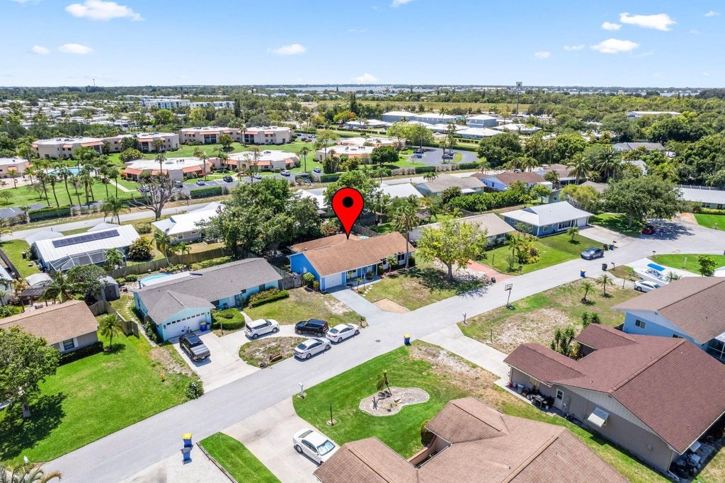 Photo of 2003 NE Aloe Calle, Jensen Beach, FL 34957 (MLS # R11093816)