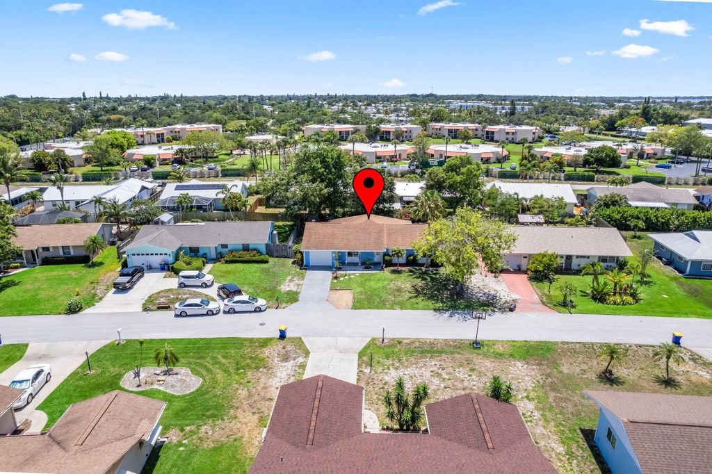 Photo of 2003 NE Aloe Calle, Jensen Beach, FL 34957 (MLS # R11093816)