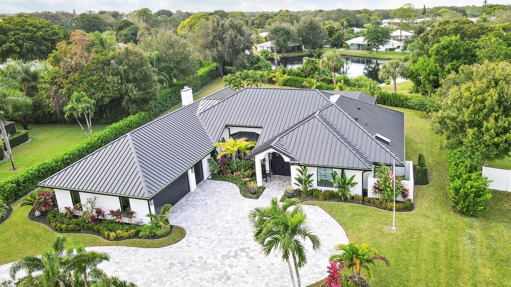 Photo of 109 SE Turtle Creek Drive, Tequesta, FL 33469 (MLS # R11143685)