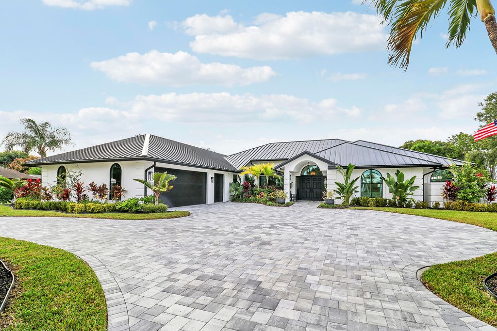Photo of 109 SE Turtle Creek Drive, Tequesta, FL 33469 (MLS # R11143685)