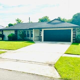Photo of 251 Las Palmas Street, Royal Palm Beach, FL 33411 (MLS # B26061158)