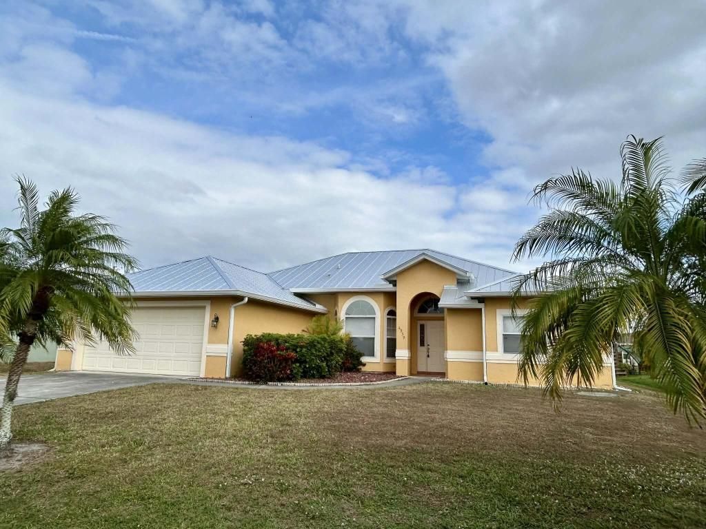 Photo of 6959 NW Hershy Circle, Port Saint Lucie, FL 34983 (MLS # R11154706)