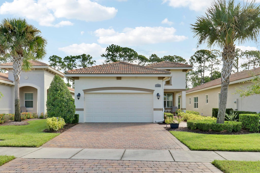 Photo of 11069 SW Visconti Way, Port Saint Lucie, FL 34986 (MLS # B26071567)