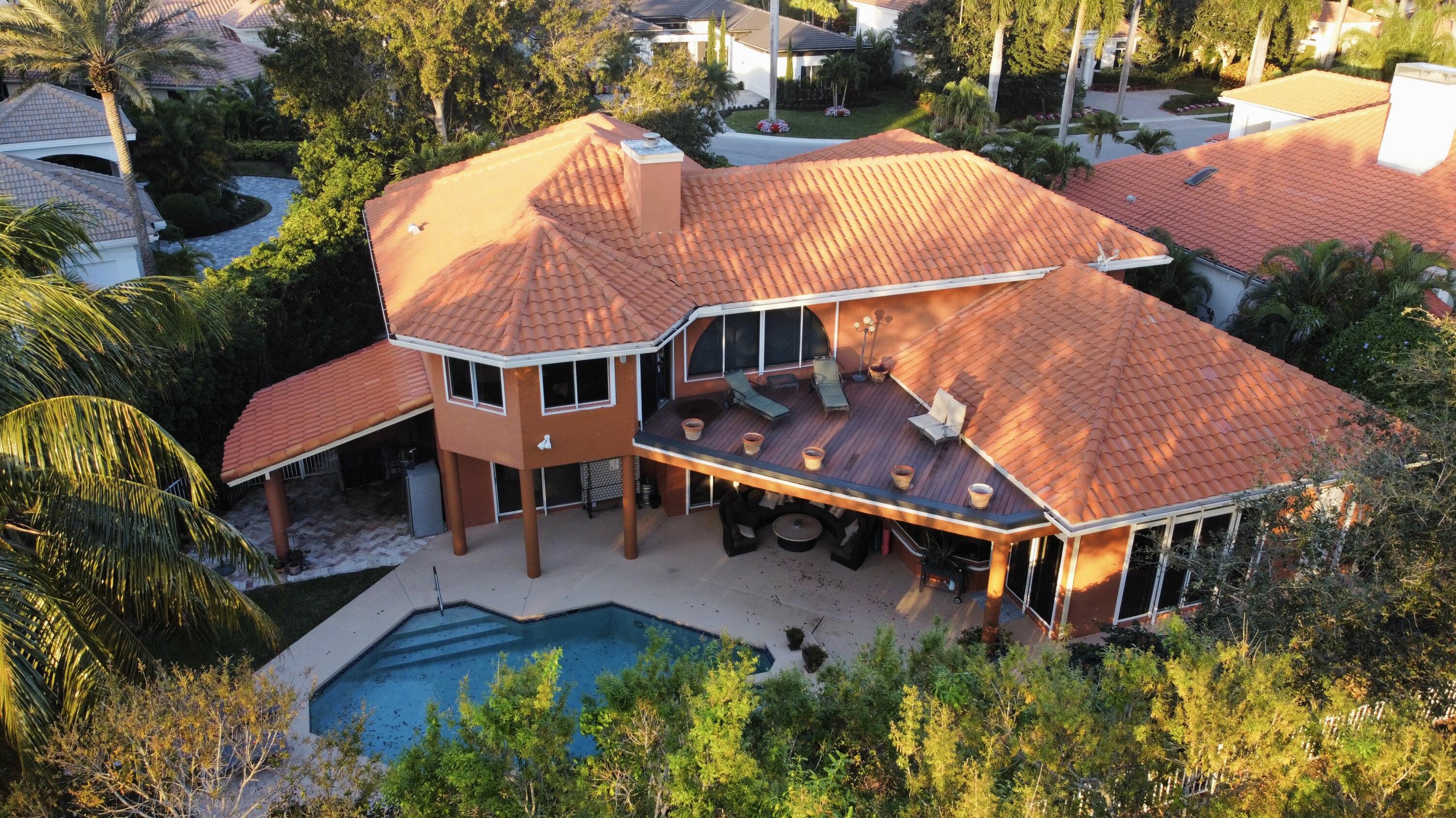 NOW EASY TO SHOW RELAX at your gorgeous, private 6 BD/5 BA home on a cul-de-sac in the Estate section of Grand Oaks featuring marble floors throughout 1st floor, a backyard great for entertaining w/ salt water pool, shower, summer kitchen & cabana bath. Downstairs 2 remodeled bathrooms w/quartz countertops, hand picked vessels & frameless glass shower doors. The upstairs Master Bedroom boosts a large deck with splendid view, bath w/spa tub, double sinks & large closet. Kitchen with granite counter tops, stainless stell appliances and island. Driveway/sides has tumbled travertine floors. Delicious fruit trees: mango, avocato, coconut tree & butterfly garden. Roof 2012. Mandatory membership to the estate of the art Broken Sound Country Club featuring golf, tennis, pickle ball, restaurant.