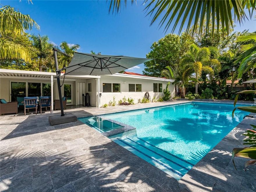 MODERN RENOVATED 4/4 IN THE HEART OF WILTON MANORS...THIS HOME HAS MUCH TO OFFER!..IN 2016 THE OWNERS COMPLETED A CUSTOM RENOVATION AND ADDITION TO THE PROPERTY...THE HOME OFFERS PORCELAIN WOOD PLANK FLOORS THROUGHOUT, ALL HURRICANE IMPACT WINDOWS AND DOORS, COMPLETE NEW KITCHEN INCLUDING ALL NEWER SS APPLIANCES, NEW CABINETRY AND CUSTOM ISLAND, QUARTZ COUNTERTOPS, & WALK-IN PANTRY...HUGE OWNERS BEDROOM WITH ENSUITE OFFERS 9' VOLUME CEILINGS, WALK-IN CLOSET, AND SWANKY DOUBLE SINK BATH W/ CUSTOM TILE...2 AMPLE SIZED GUEST BEDROOMS...OUTDOORS ENJOY A 40 X 16 (8.5 FEET) SALT-WATER HEATED POOL AND SPA ALL REFINISHED...BEAUTIFUL TROPICAL YARD, INCLUDES A COVERED PORCH LANDSCAPE LIGHTING, AND MARBLE PAVERS...A SEPARATE IN-LAW SUITE WITH PRIVATE ENTRANCE AND YARD OFFERS ENDLESS POTENTAIL.
