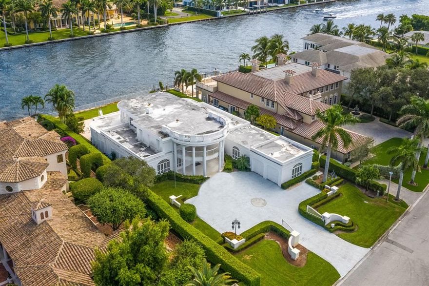 Incredible opportunity to renovate or build your dream home on the Intracoastal Waterway in Royal Palm Yacht & Country Club! This oversized trophy lot sits on 100' of water in Boca Raton's most exclusive community.