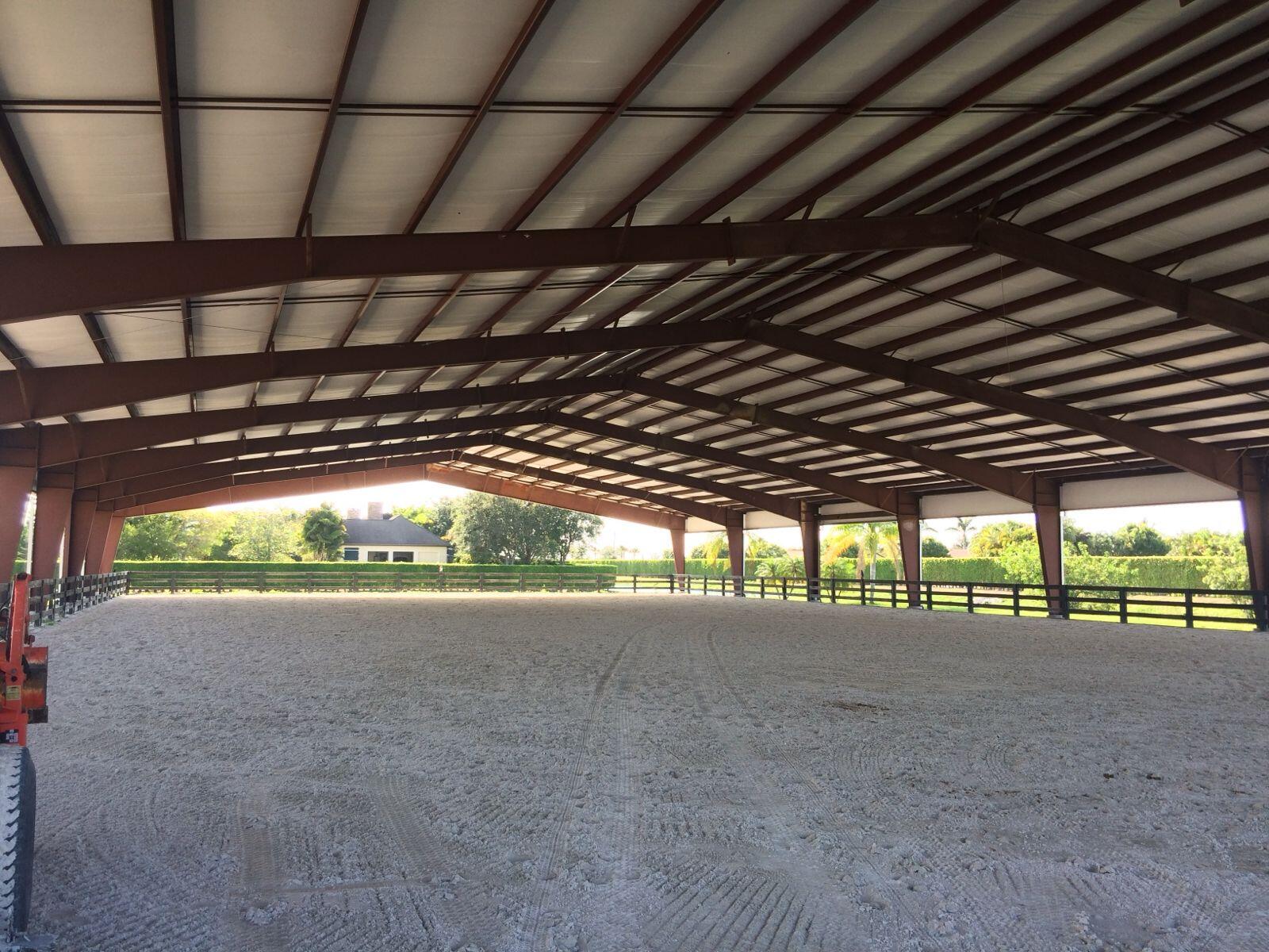Want to spend the winter in hacking distance to WEF AND with a covered arena? This farm is for you. Features an enormous covered arena, big enough for jumpers AND a large sand ring. 4 horse walker. 8 paddocks. RV hookup. 2/2 barn apartment available as well. Owner keeps her 3-4 horses on property, the rest is for ONE group of 12-16 horses. AC tack room for tenant, dedicated feed room, hay, shared laundry,. Property is NOT available in the off season. Plenty of room for hay, shavings . Enough jumps for both arenas, which are maintained daily by the landlord. Fly spray system throughout. Landlord maintains property during season and handles manure removal and fly spray which is then billed to client accordingly