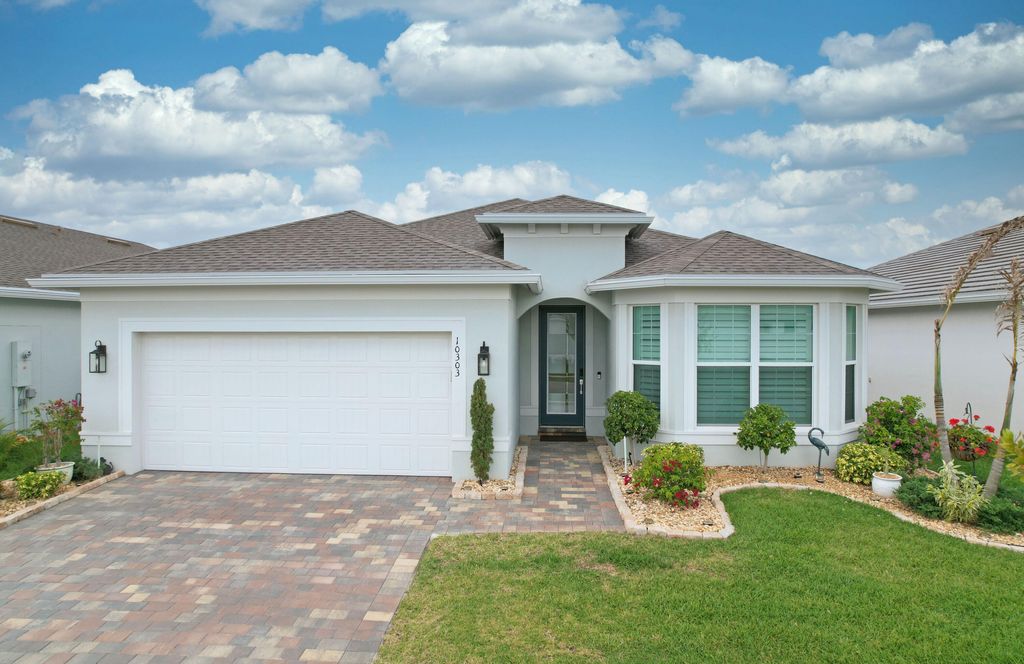 Photo of 10303 SW Tetian Drive, Port Saint Lucie, FL 34987 (MLS # B26019558)