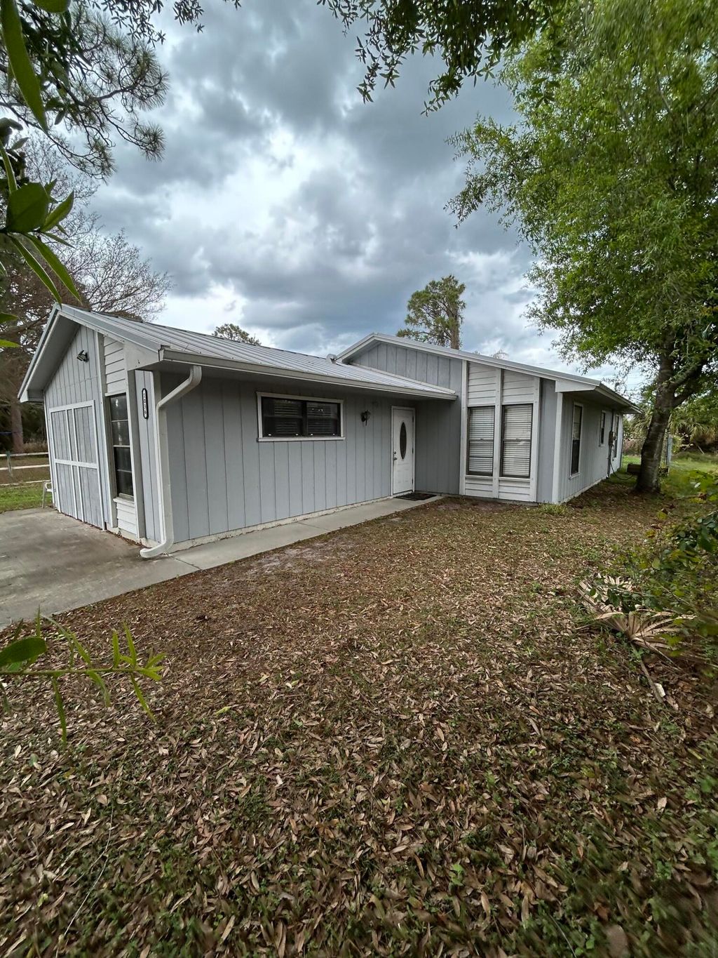 Photo of 1036 SW 19th Ave Avenue SW, Vero Beach, FL 32962 (MLS # B26009755)